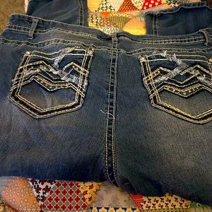 Maurice’s capri/cropped jeans. Embellished on pockets.